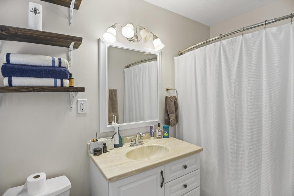1934 Huntsman Drive Aiken, SC 29803 - Photo 15 of 19 a bathroom with a sink and a mirror