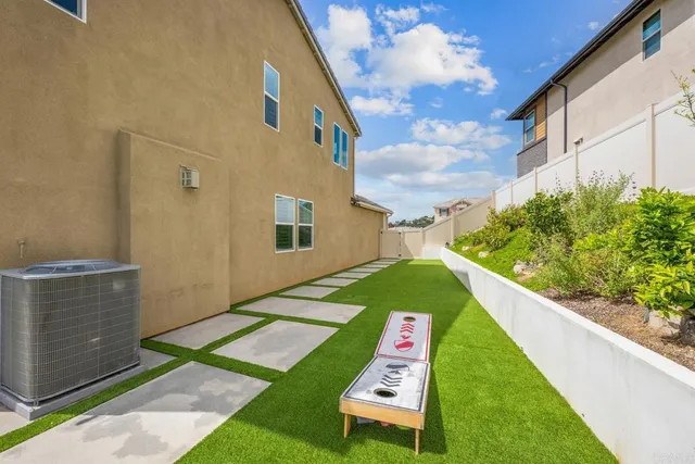 a view of a backyard with plants