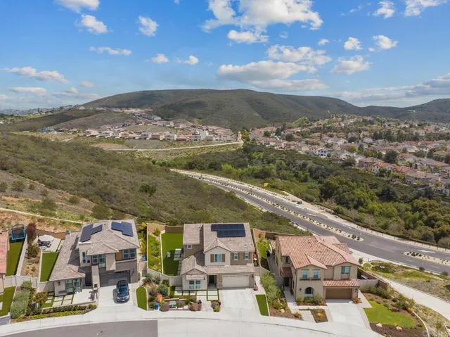 a view of city with ocean