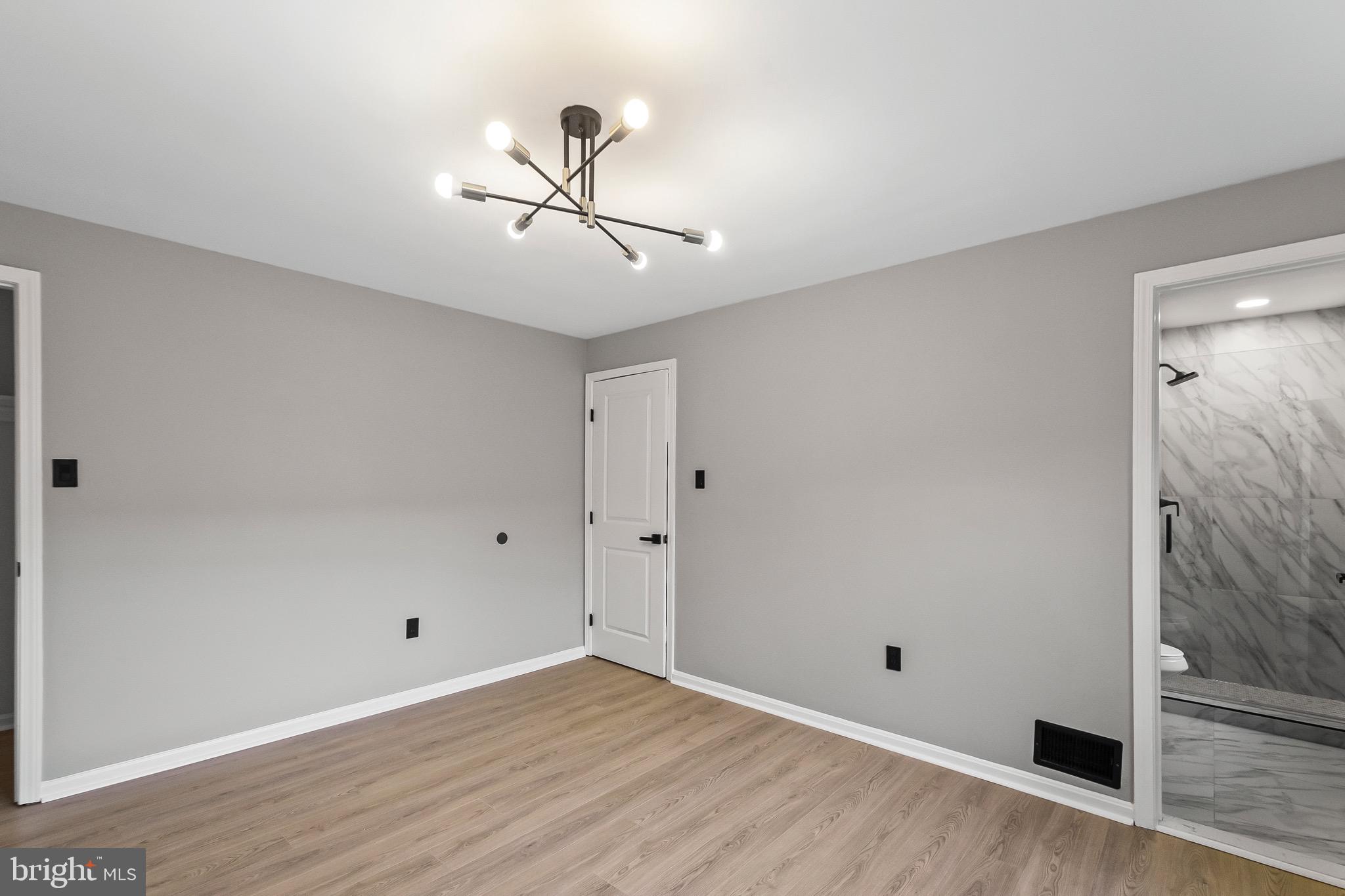 1527 North Colonial Terrace, Unit B Arlington, VA 22209 - Photo 18 of 28 a view of room with hardwood floor and ceiling fan