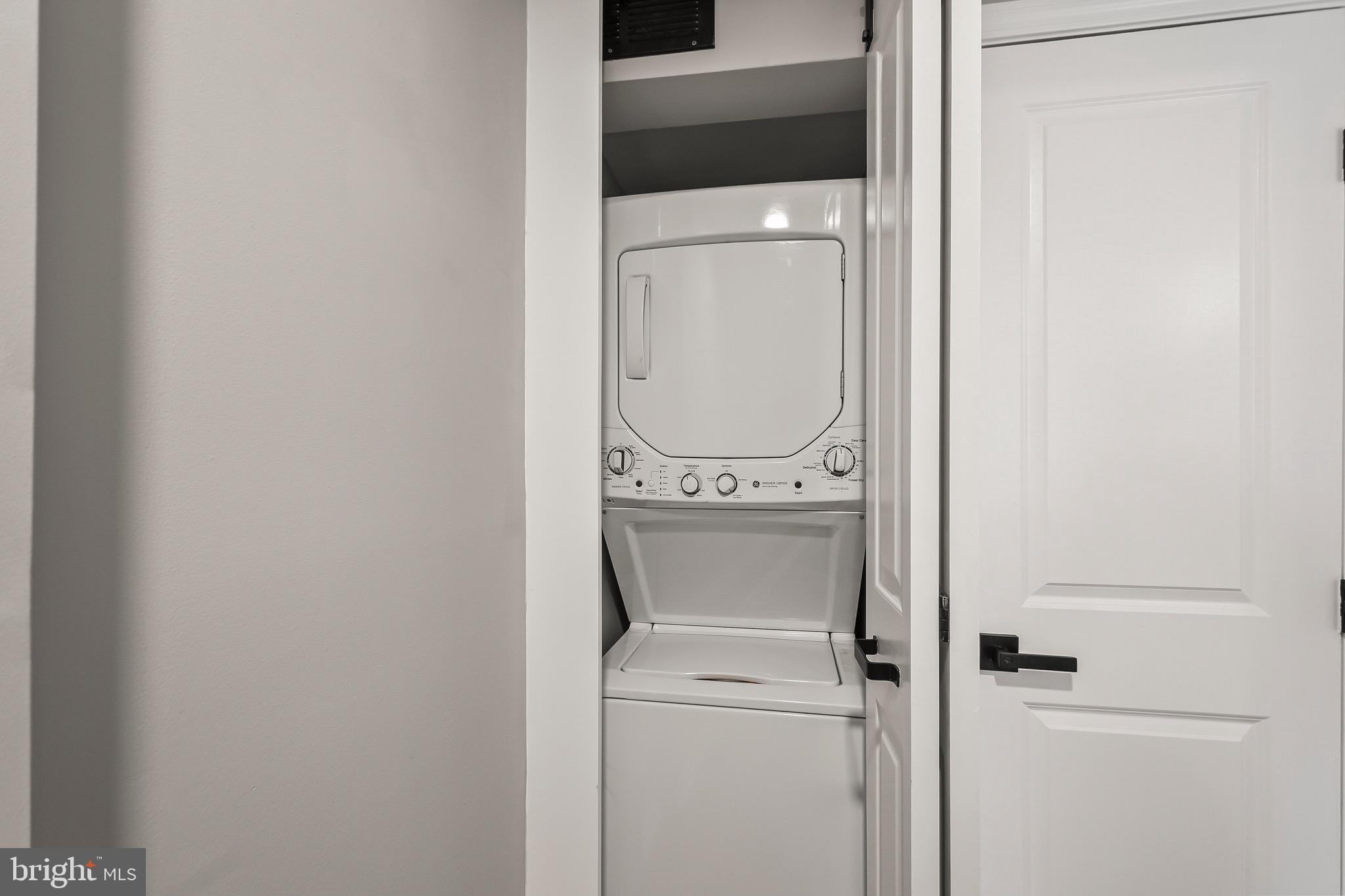 1527 North Colonial Terrace, Unit B Arlington, VA 22209 - Photo 27 of 28 a close up view of a washer and dryer