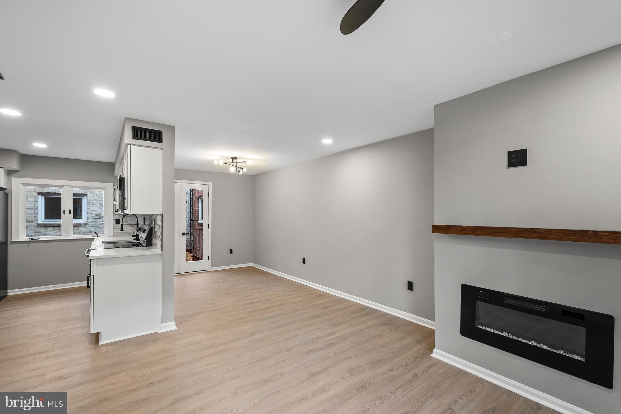 1527 North Colonial Terrace, Unit B Arlington, VA 22209 - Photo 9 of 28 a view of kitchen with furniture and wooden floor