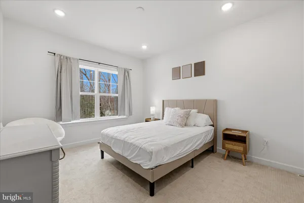 a view of livingroom with furniture and natural light