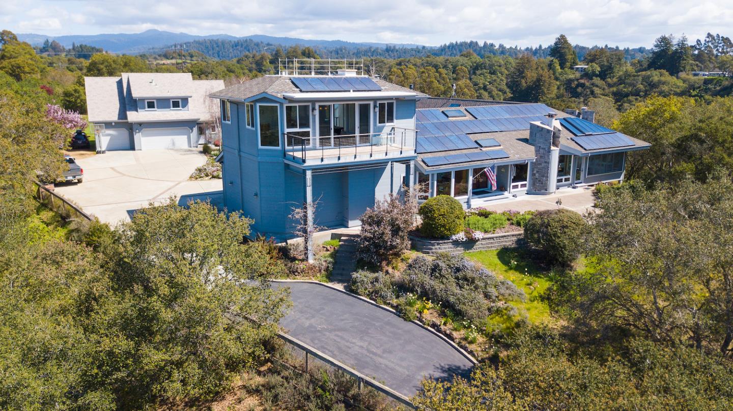 150 Amigo Road Soquel, CA 95073 - Photo 1 of 81 an aerial view of a house with a yard and a large tree