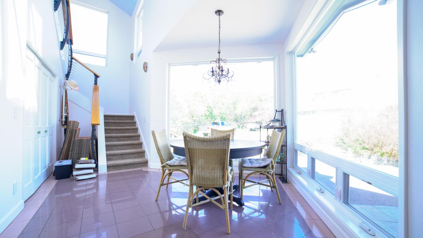 150 Amigo Road Soquel, CA 95073 - Photo 11 of 81 a view of a dining room with furniture window and wooden floor