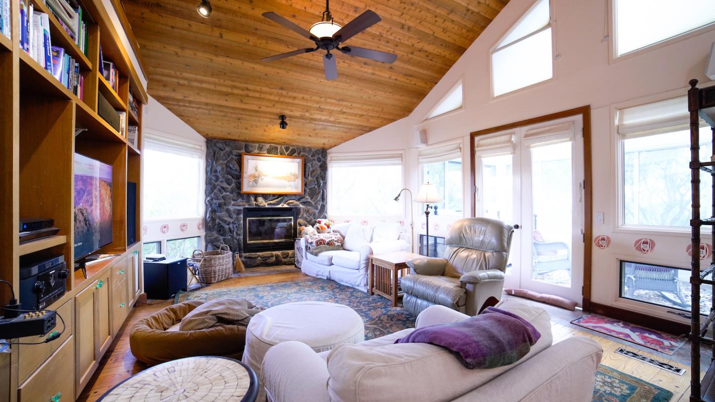 150 Amigo Road Soquel, CA 95073 - Photo 36 of 81 a living room with furniture fireplace and flat screen tv