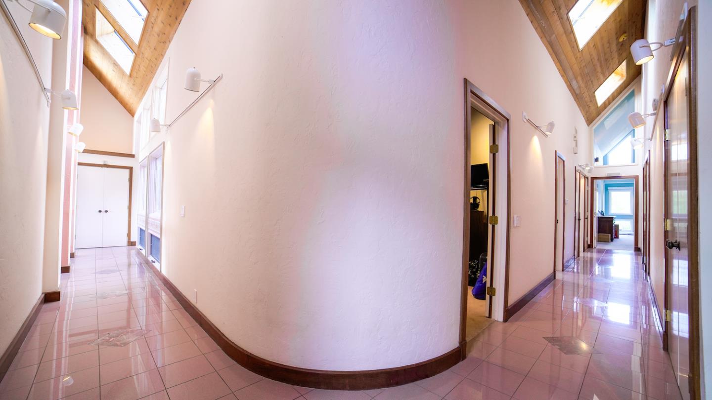 150 Amigo Road Soquel, CA 95073 - Photo 38 of 81 a view of a hallway with wooden floor and staircase