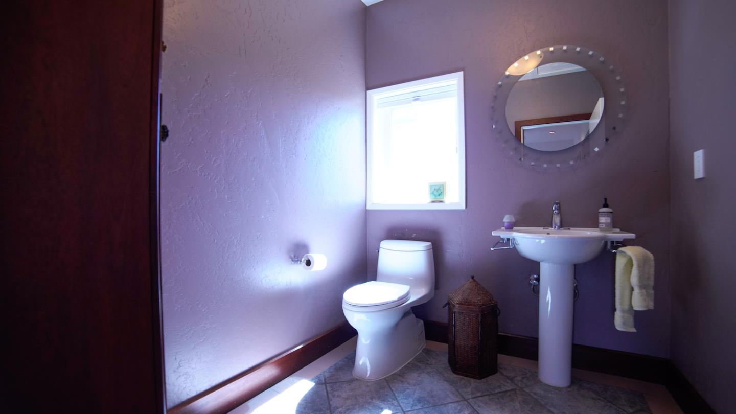 150 Amigo Road Soquel, CA 95073 - Photo 54 of 81 a bathroom with a toilet sink and mirror