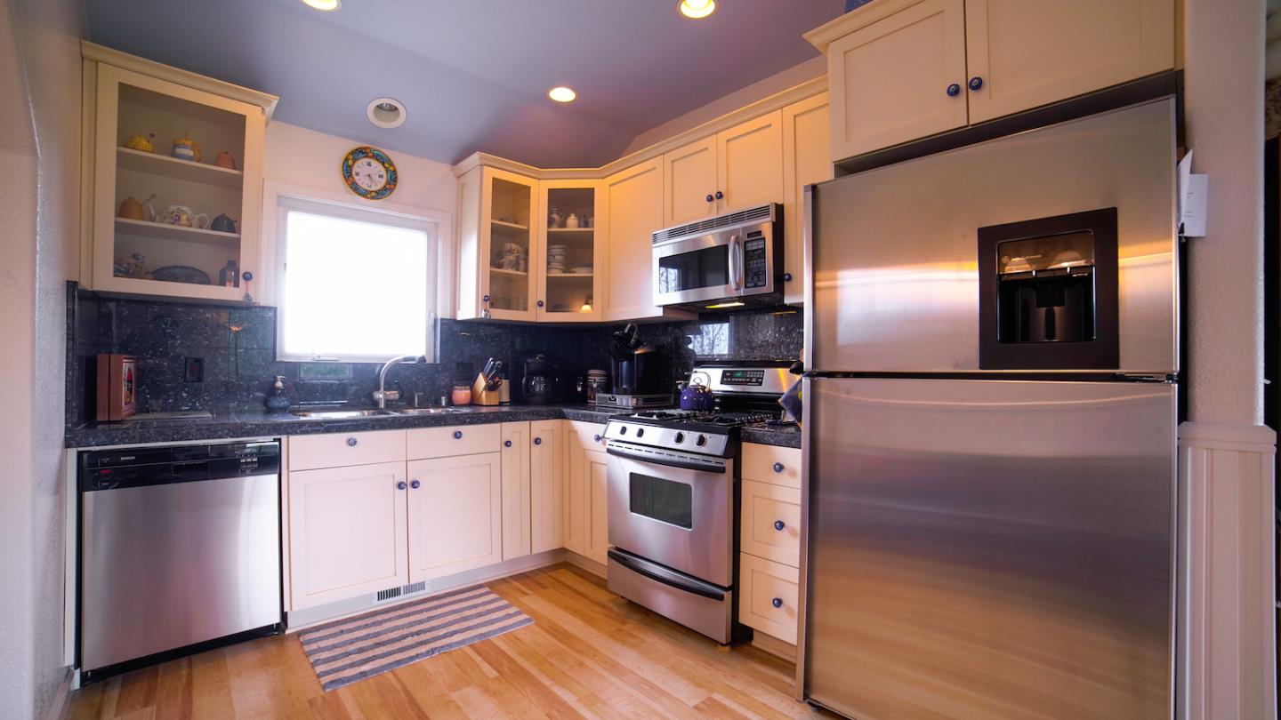 150 Amigo Road Soquel, CA 95073 - Photo 66 of 81 a kitchen with stainless steel appliances granite countertop a refrigerator and a sink