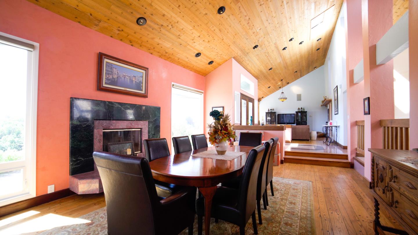 150 Amigo Road Soquel, CA 95073 - Photo 8 of 81 a view of a dining room with furniture and a fireplace