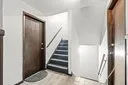 a view of entryway with stairs