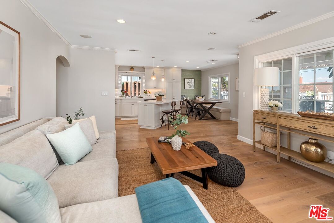 7517 Earldom Avenue Playa del Rey, CA 90293 - Photo 12 of 27 a living room with furniture and wooden floor