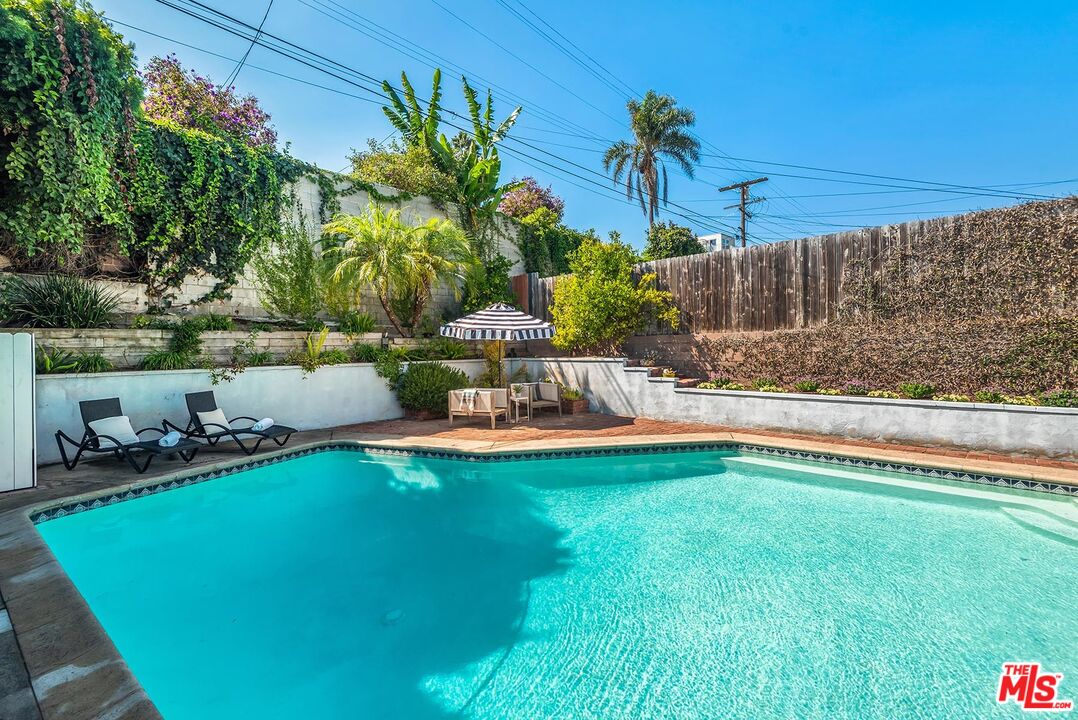 7517 Earldom Avenue Playa del Rey, CA 90293 - Photo 21 of 27 a view of a swimming pool with a patio