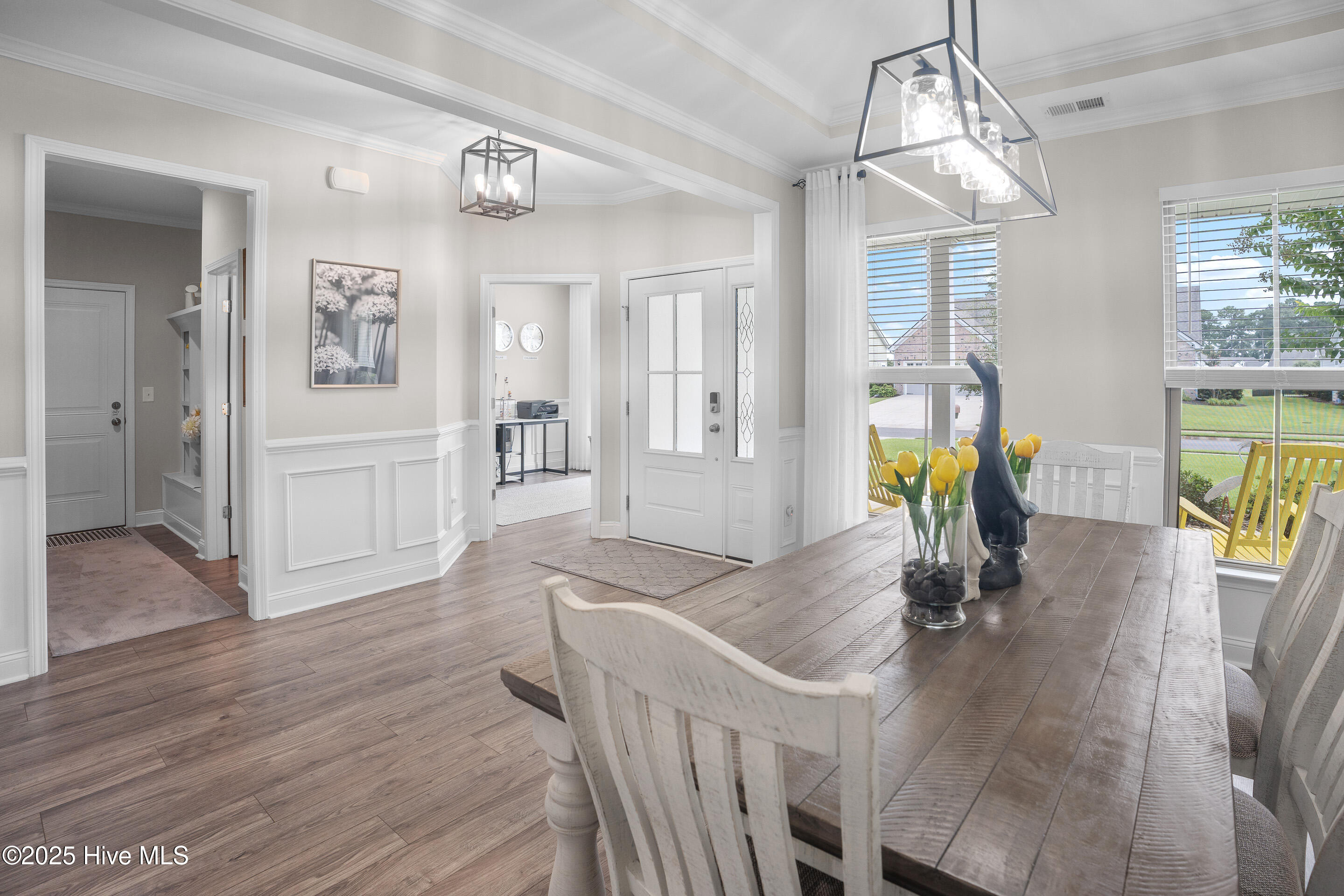 172 First Light Lane Calabash, NC 28467 - Photo 17 of 67 dining area looking toward front door and hall to garages