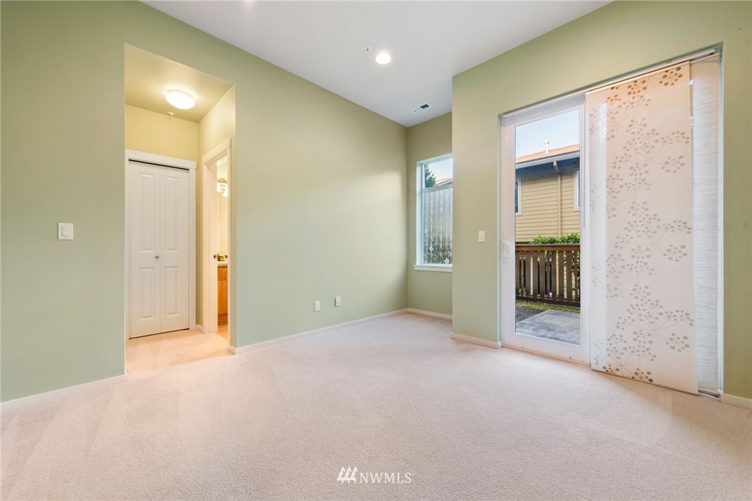 72 Sky Ridge Road Northwest, Unit 903 Issaquah, WA 98027 - Photo 22 of 28 a view of a big room with closet and windows