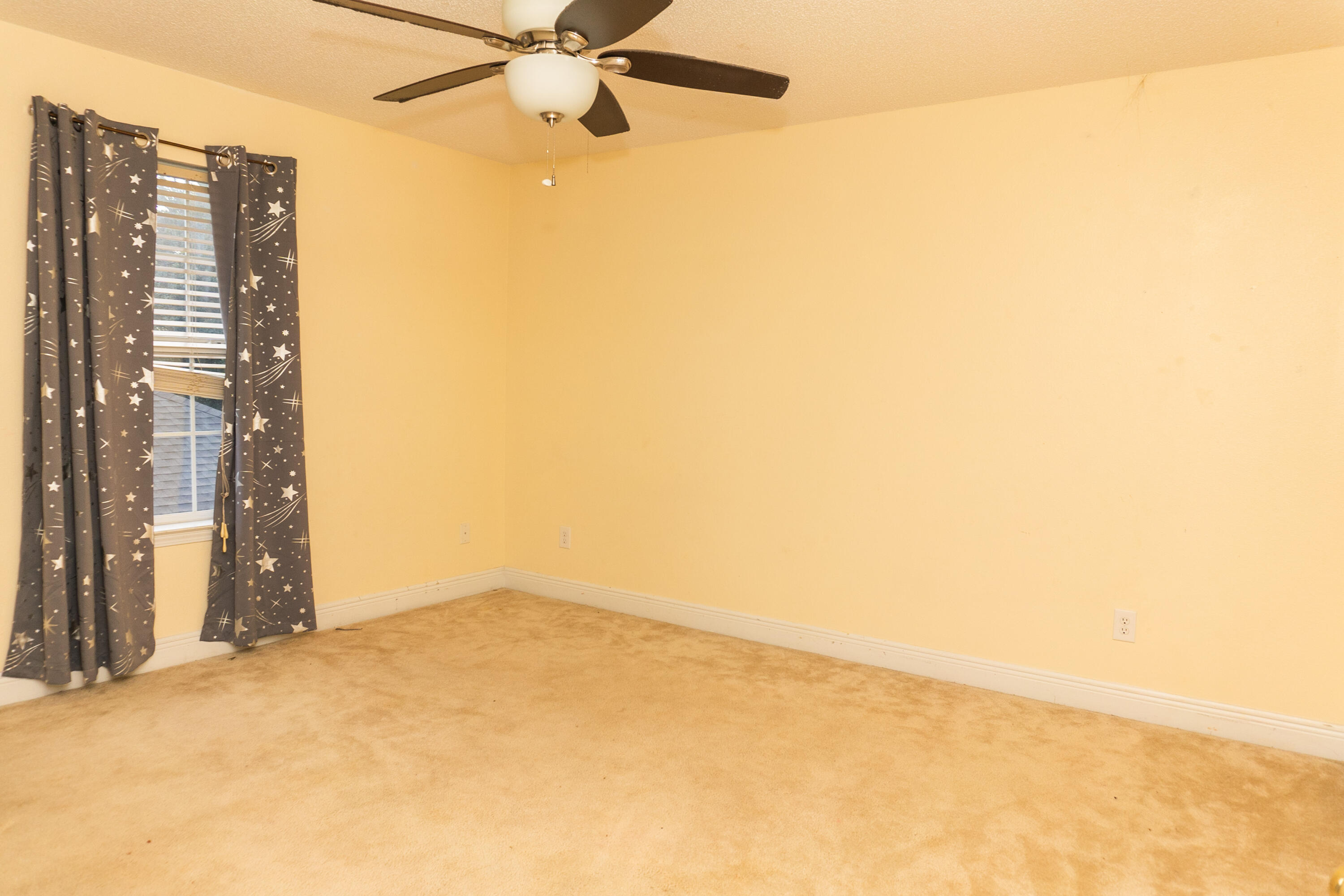 516 Vulpes Sanctuary Loop Crestview, FL 32536 - Photo 17 of 33 a view of an empty room
