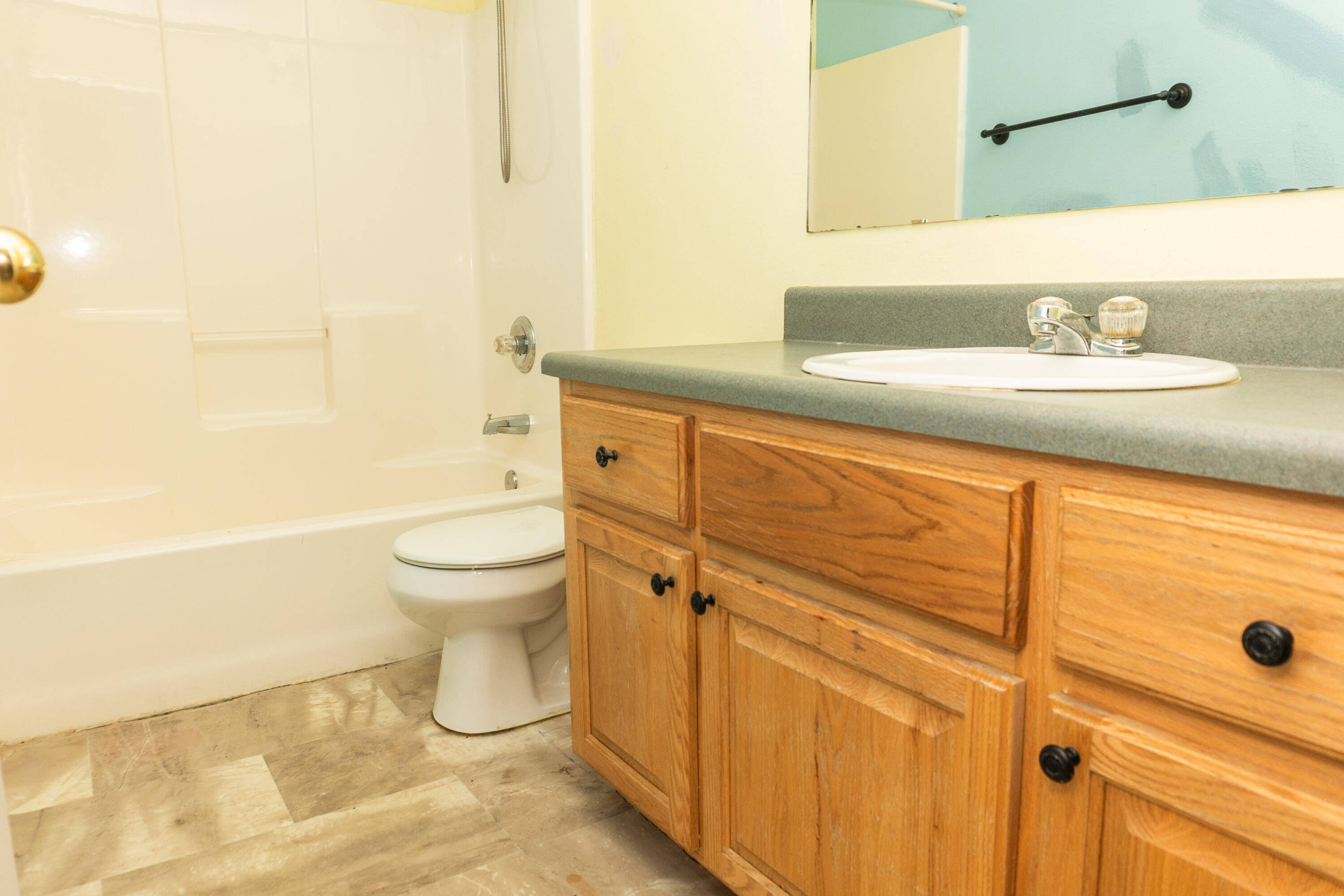 516 Vulpes Sanctuary Loop Crestview, FL 32536 - Photo 18 of 33 a bathroom with a sink and a mirror