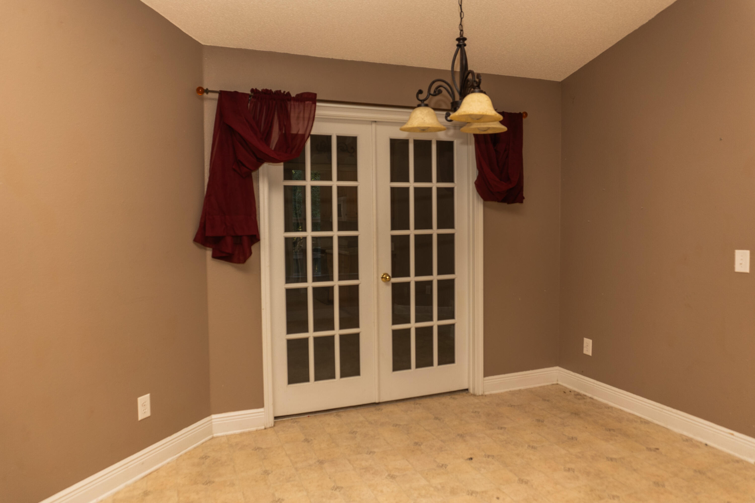516 Vulpes Sanctuary Loop Crestview, FL 32536 - Photo 20 of 33 a view of empty room with windows