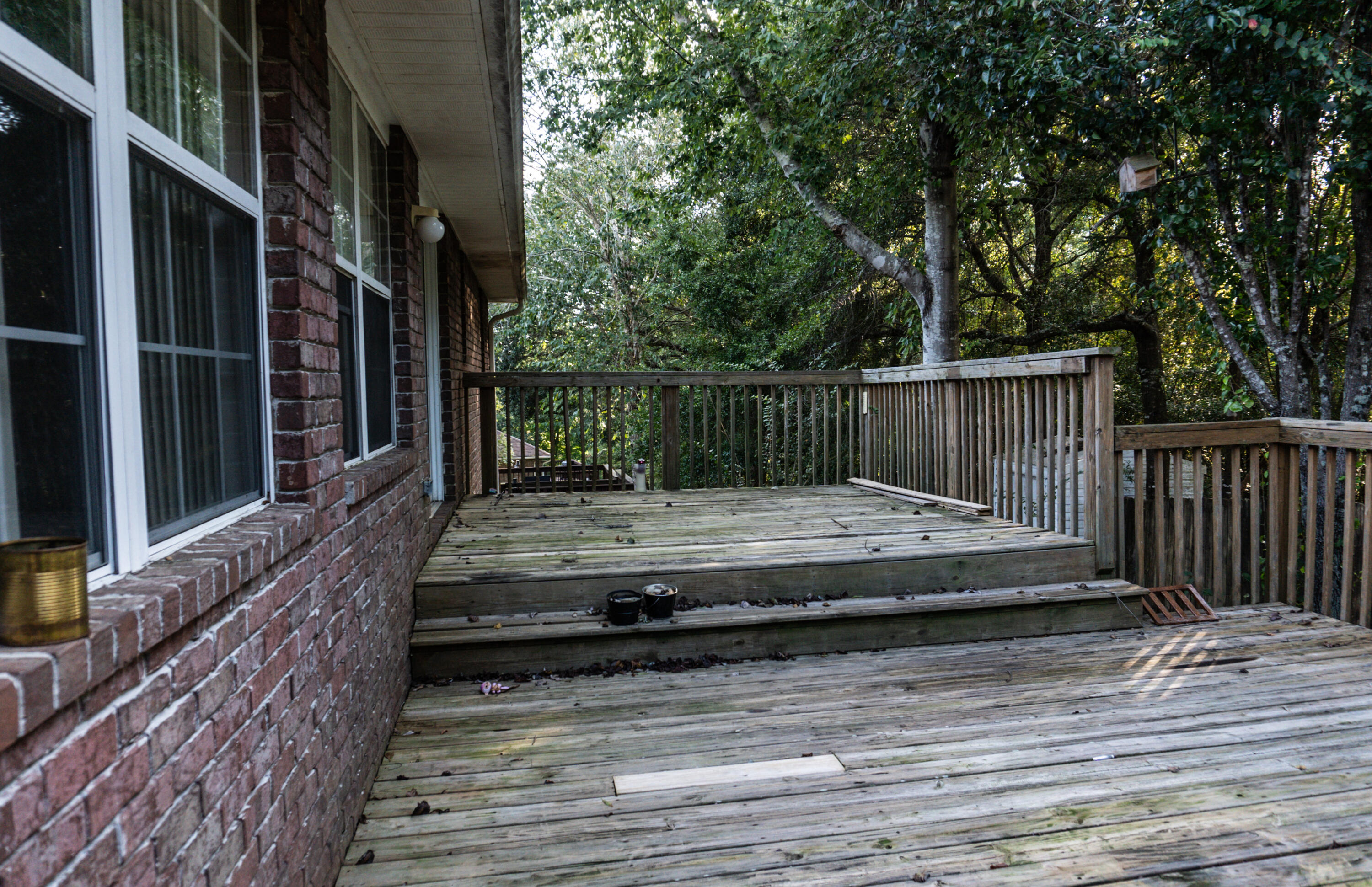 516 Vulpes Sanctuary Loop Crestview, FL 32536 - Photo 29 of 33 a view of balcony and wooden floor
