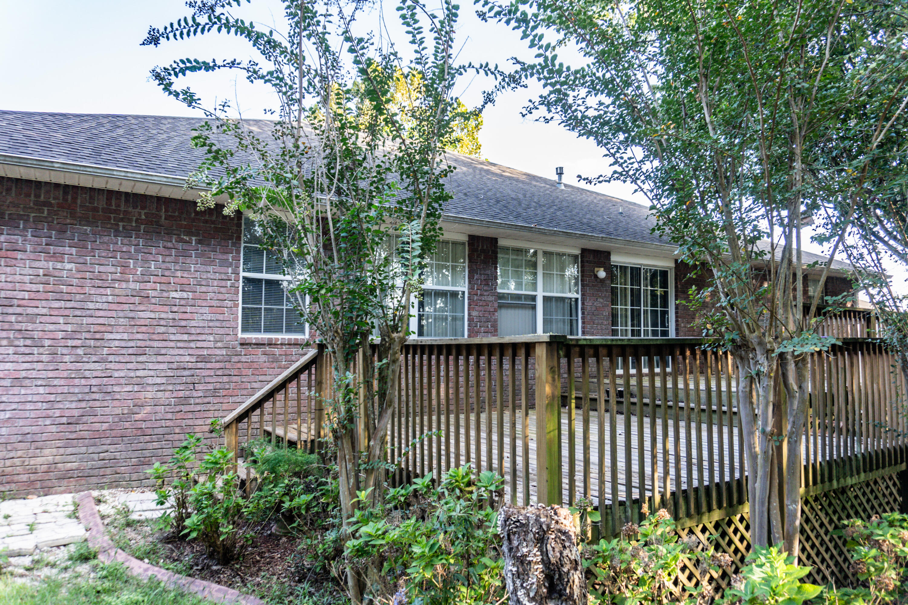 516 Vulpes Sanctuary Loop Crestview, FL 32536 - Photo 33 of 33 a view of a house with a flower garden