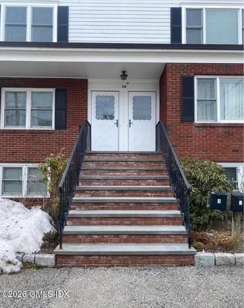 a front view of a house with entryway