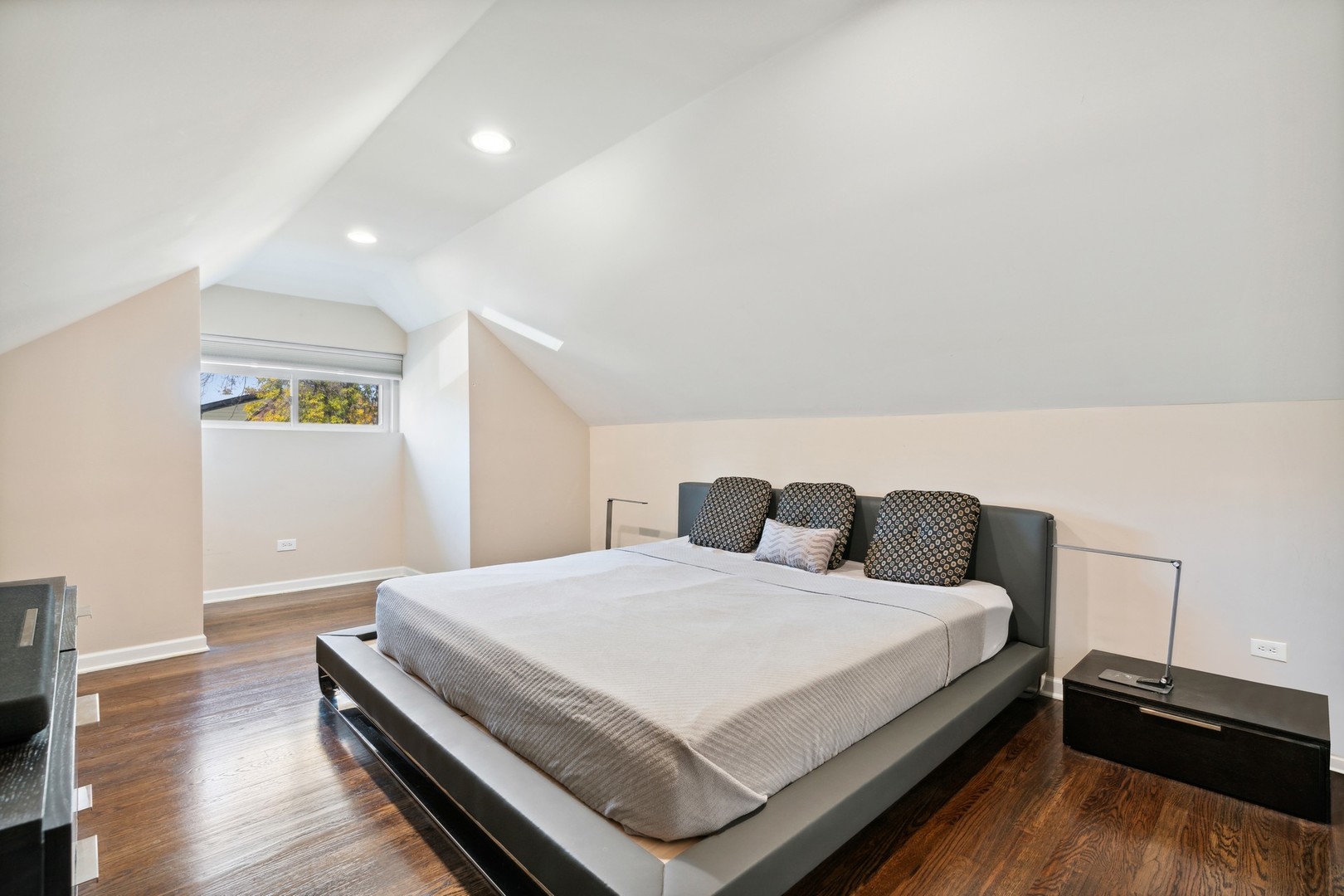 2239 North Keystone Avenue Chicago, IL 60639 - Photo 11 of 31 a bedroom with a bed and wooden floor