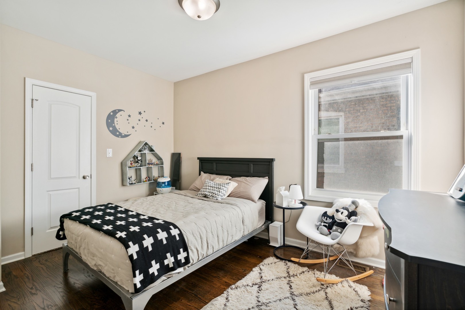 2239 North Keystone Avenue Chicago, IL 60639 - Photo 14 of 31 a bedroom with a bed and wooden floor