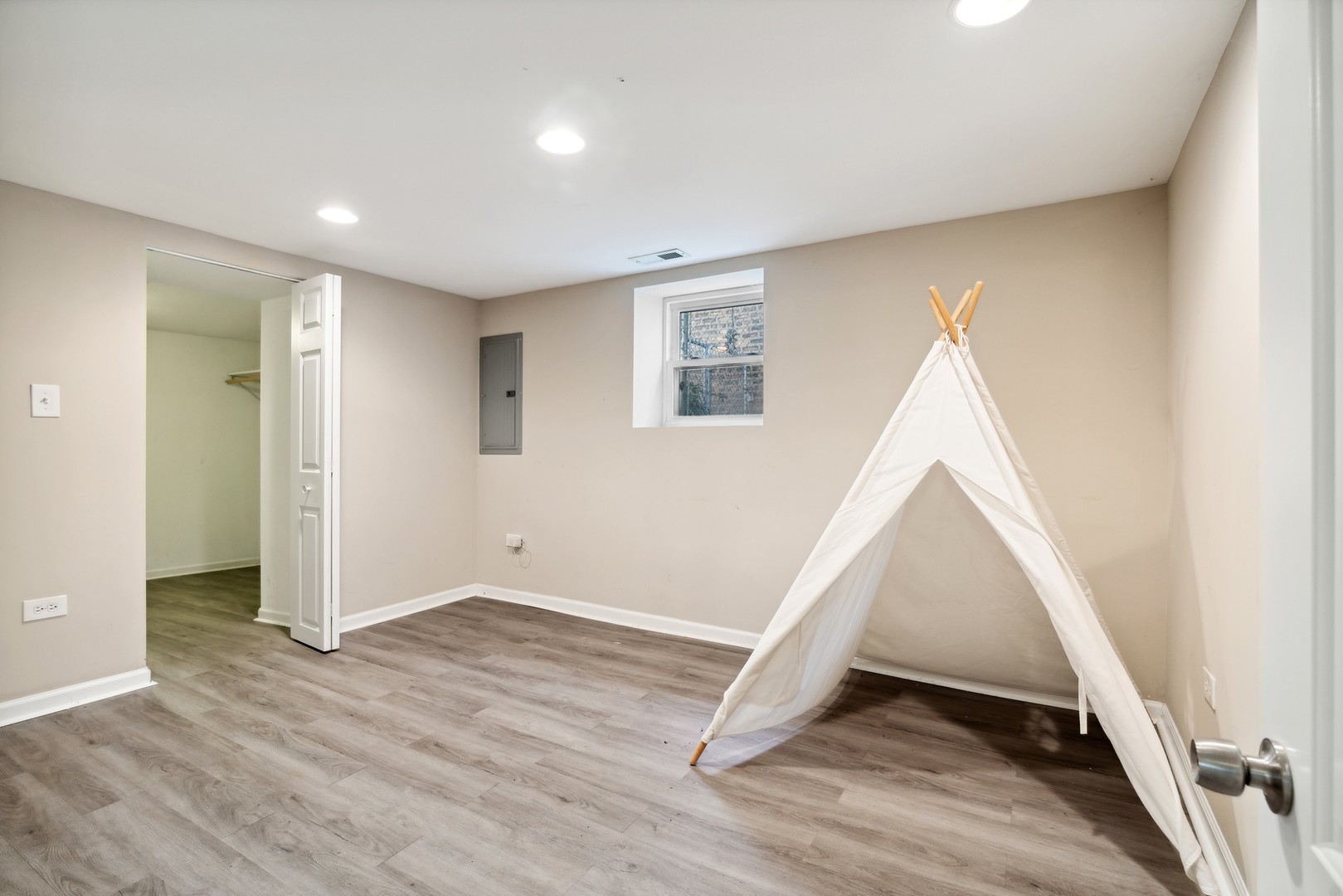 2239 North Keystone Avenue Chicago, IL 60639 - Photo 16 of 31 a view of an empty room with wooden floor
