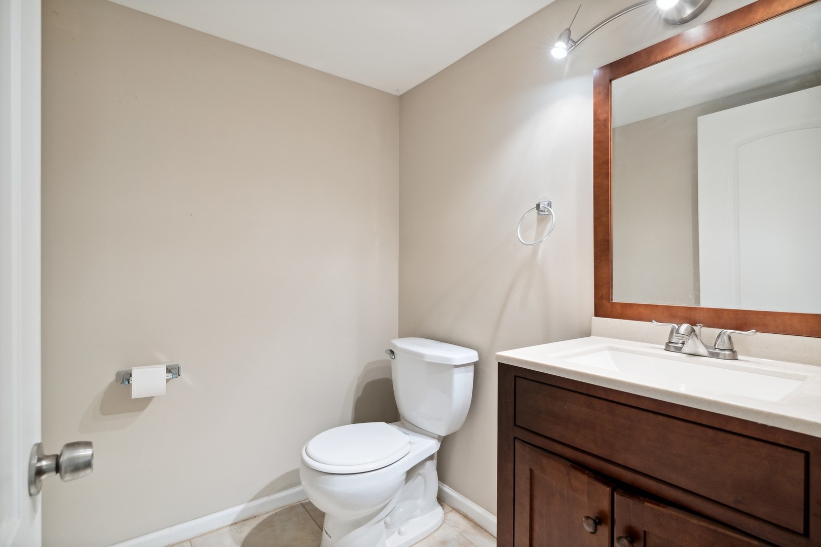 2239 North Keystone Avenue Chicago, IL 60639 - Photo 18 of 31 a bathroom with a sink and a toilet