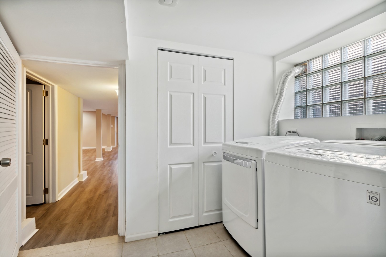 2239 North Keystone Avenue Chicago, IL 60639 - Photo 22 of 31 a view of walk in closet with window