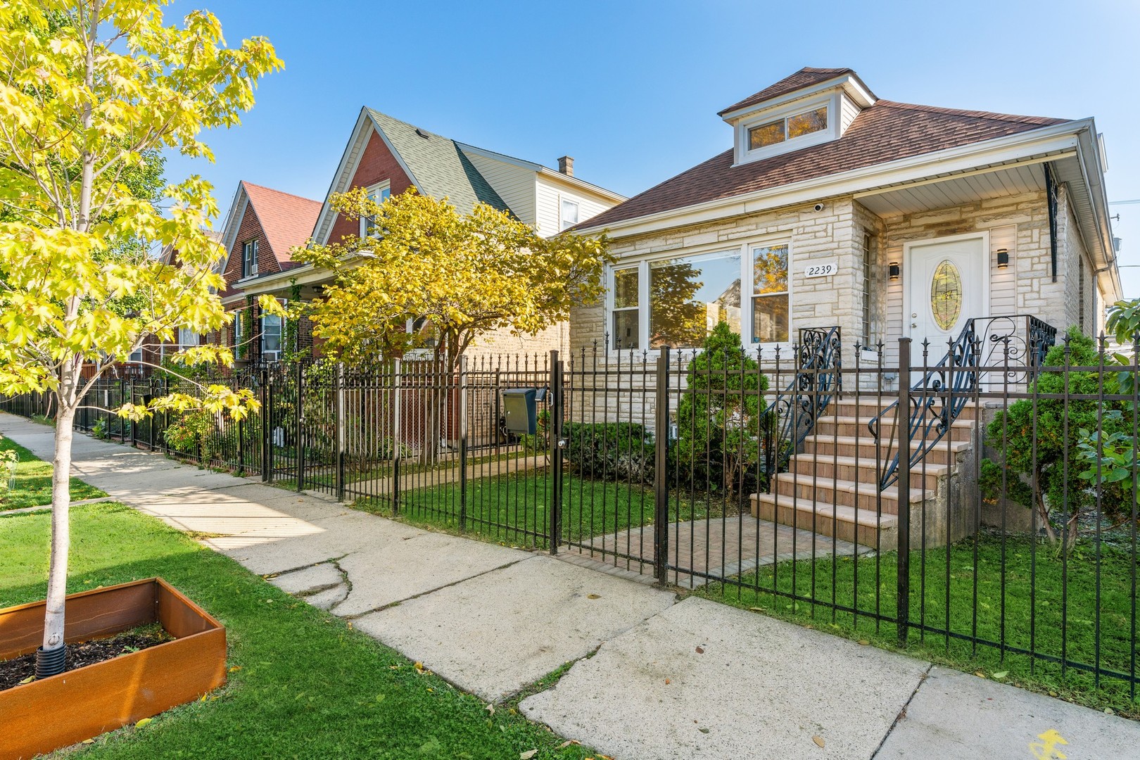 2239 North Keystone Avenue Chicago, IL 60639 - Photo 28 of 31 front view of a house with a view of a house