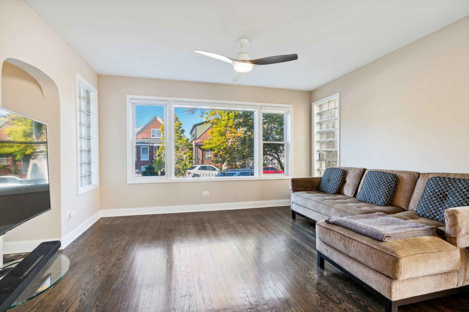 2239 North Keystone Avenue Chicago, IL 60639 - Photo 3 of 31 a living room with furniture and a large window