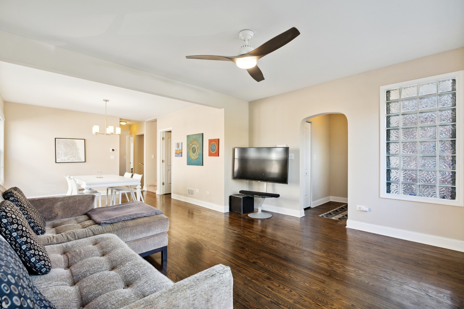 2239 North Keystone Avenue Chicago, IL 60639 - Photo 5 of 31 a living room with furniture and a flat screen tv