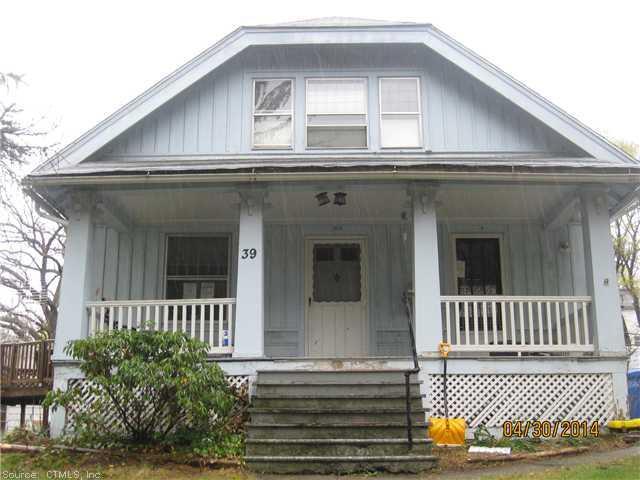 39 Montgomery Street Waterbury, CT 06708 - Photo 1 of 1 a view of a house with a window