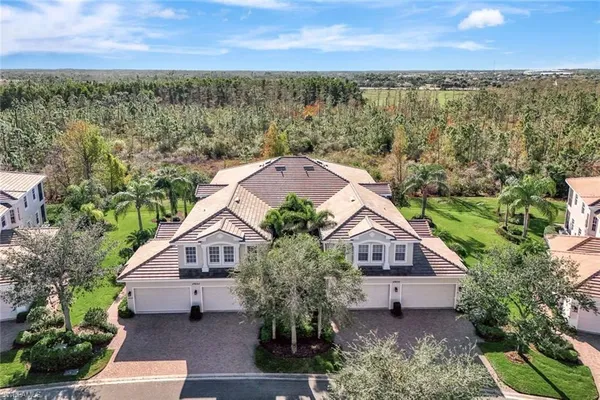 a house with trees in the background