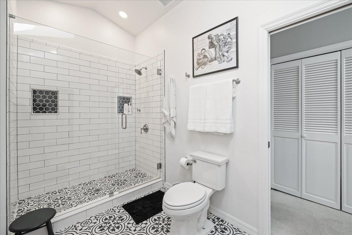 1650 North Riverside Drive Indialantic, FL 32903 - Photo 39 of 88 a bathroom with a toilet and a shower