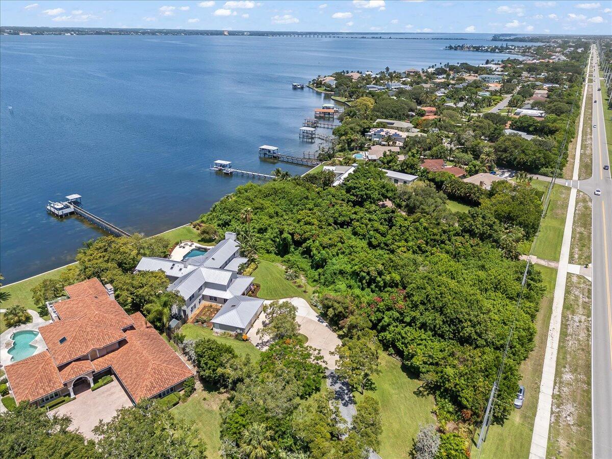 1650 North Riverside Drive Indialantic, FL 32903 - Photo 84 of 88 an aerial view of a house with a yard
