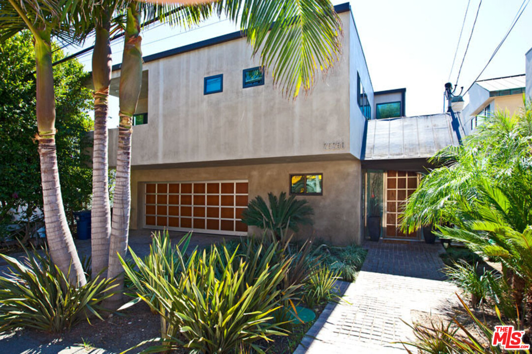 25250 Malibu Road Malibu, CA 90265 - Photo 6 of 31 a front view of small house with garden