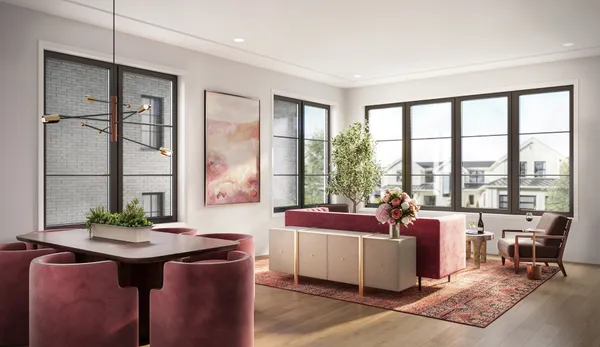 a bathroom with a double vanity sink a toilet and shower