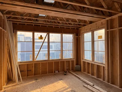 a view of a room with wooden walls