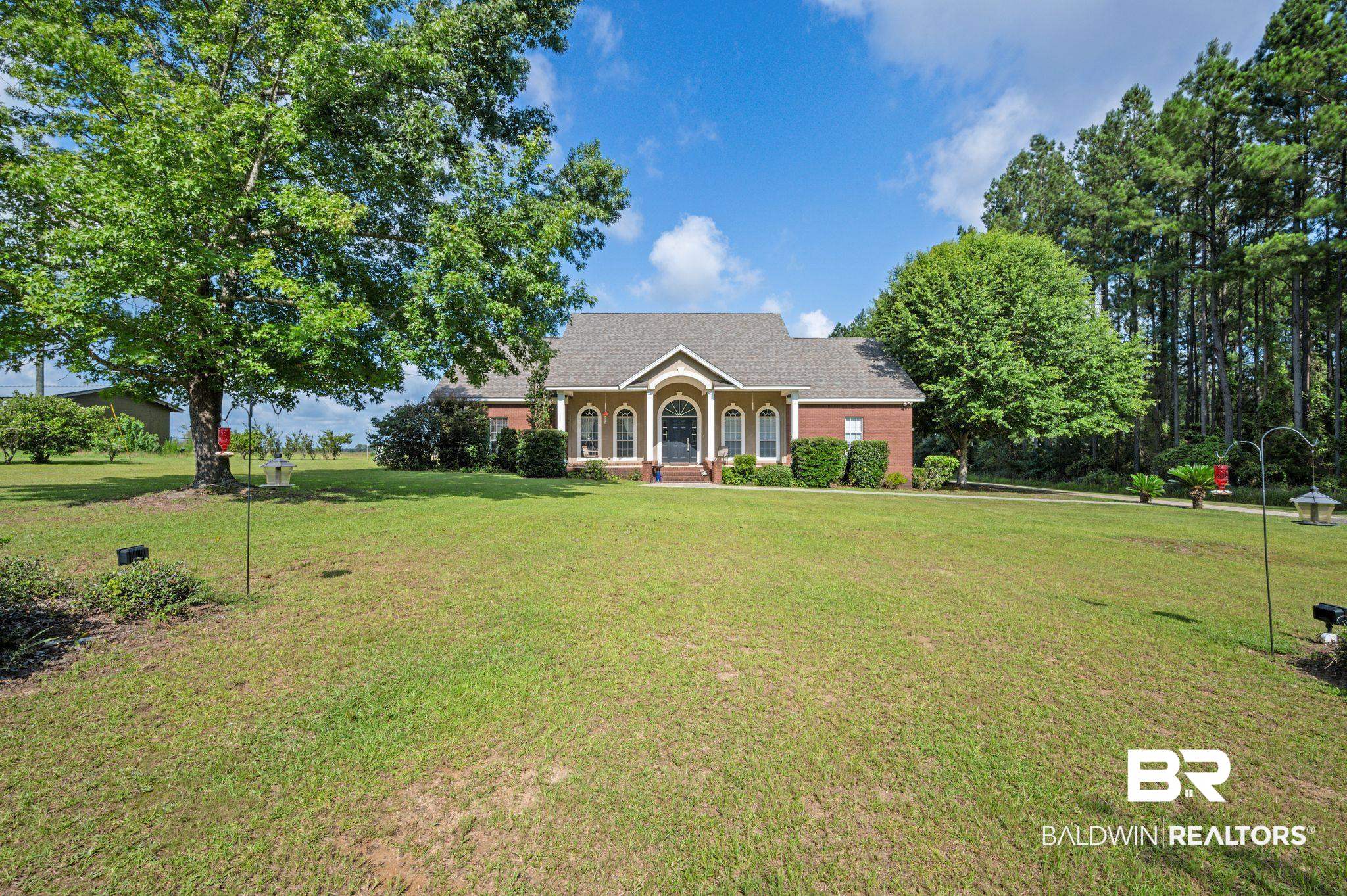 48513 Phillipsville Road Bay Minette, AL 36507 - Photo 2 of 50 View of front of home with a front lawn