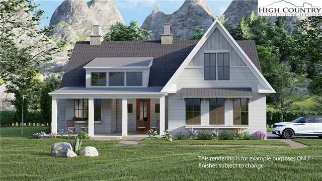 an aerial view of houses with yard