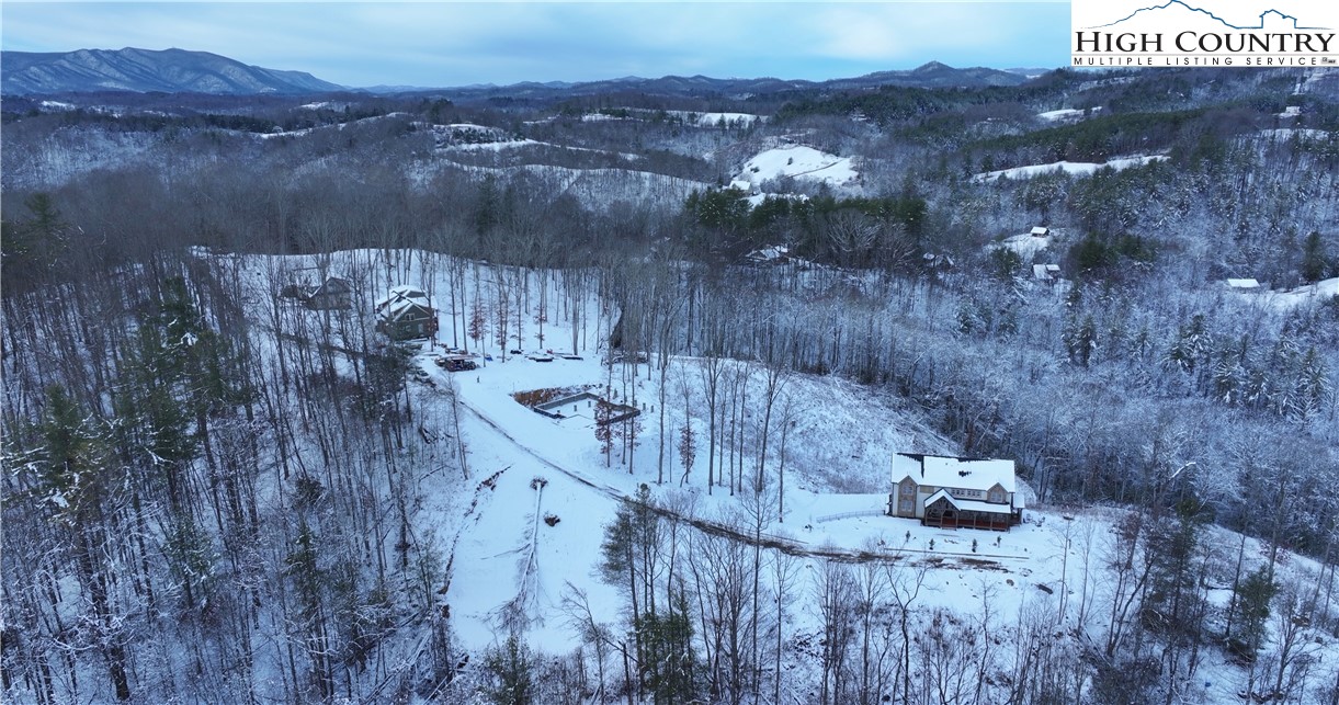 403 Autumn Leaf Way Crumpler, NC 28617 - Photo 25 of 45 a view of a city with a mountain