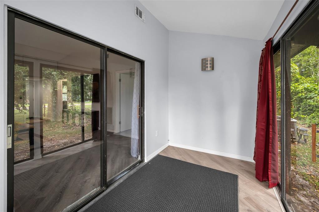 1890 Wolford Road, Unit 3 Clearwater, FL 33760 - Photo 35 of 47 a view of a hallway with interior of the house