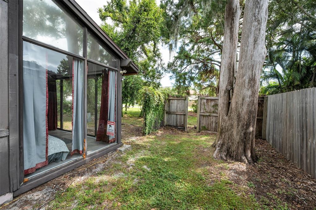 1890 Wolford Road, Unit 3 Clearwater, FL 33760 - Photo 37 of 47 a backyard of a house with seating space