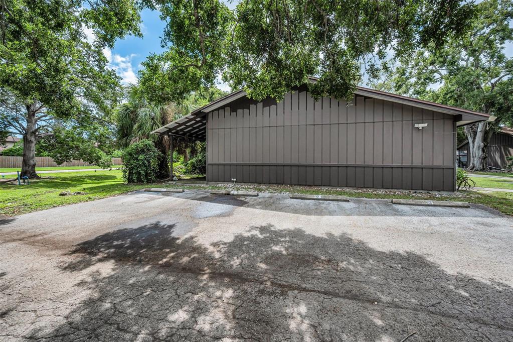 1890 Wolford Road, Unit 3 Clearwater, FL 33760 - Photo 45 of 47 a view of a backyard with a small cabin