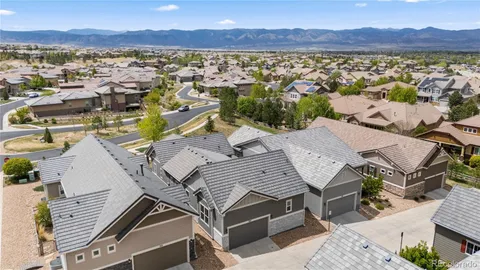 an aerial view of residential house with outdoor space