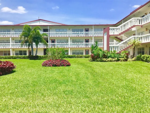 a view of a lake and a yard