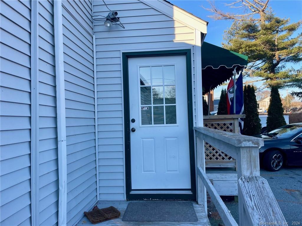 27 East Main Street, Unit B Clinton, CT 06413 - Photo 1 of 1 a view of shops in a room