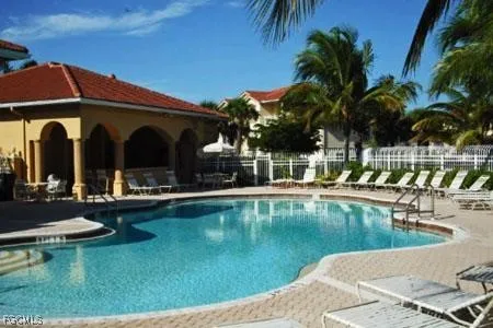 front view of a building with a garden